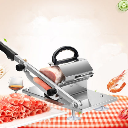 Sausage and meat slicer with sliced sausages and meats on a checkered tablecloth.